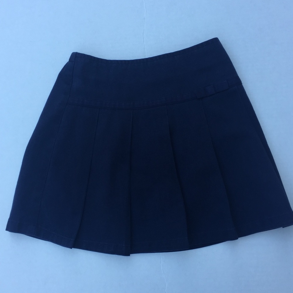 Navy blue girls uniform skort.